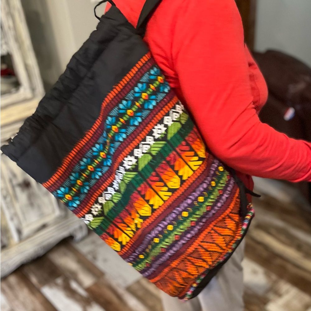 New handmade aztec print bag with drawstring top. Suede shoulder bag unused